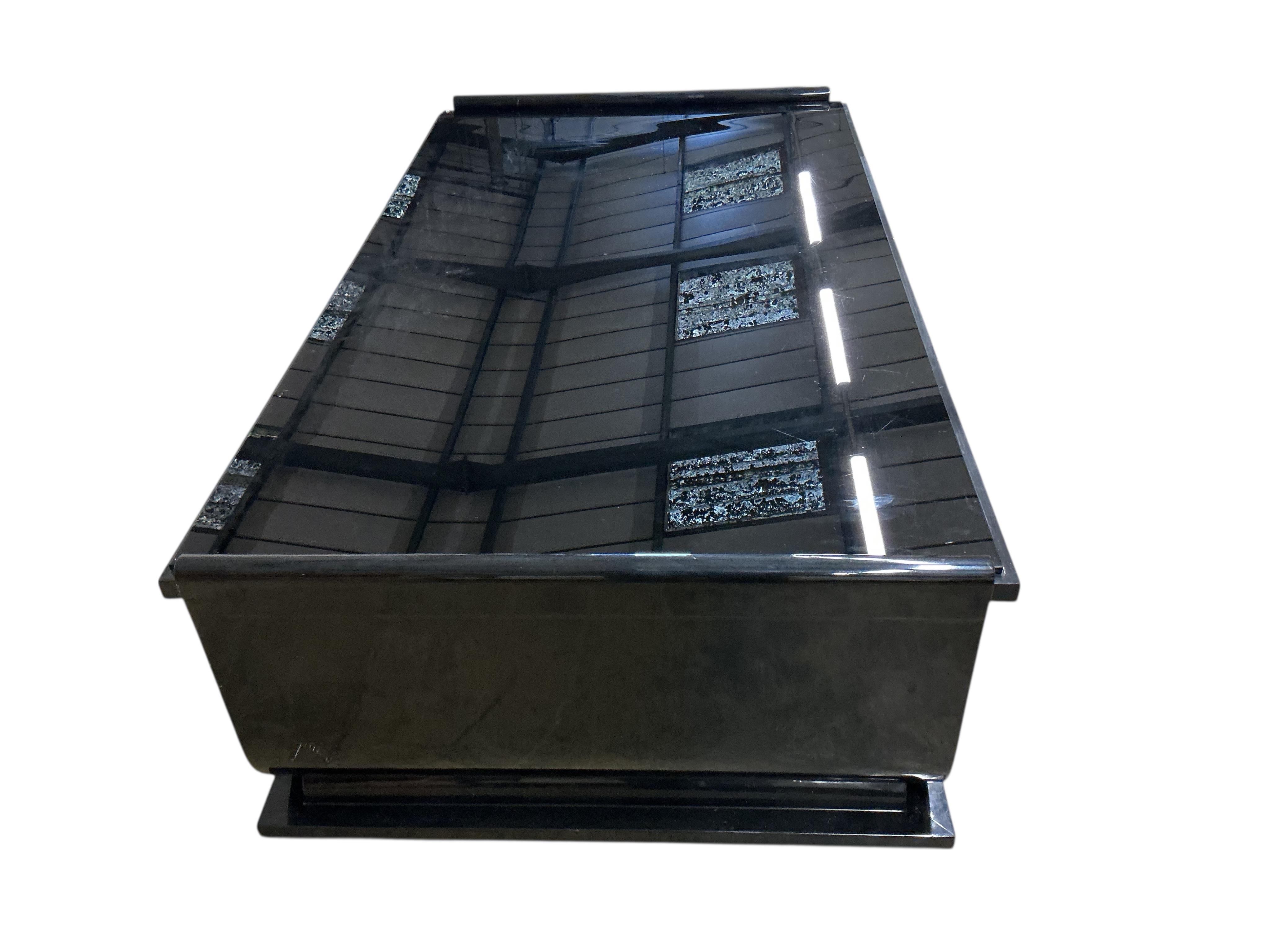 A Contemporary rectangular ebonized glass top coffee table, width 180cm, depth 102cm, height 51cm
